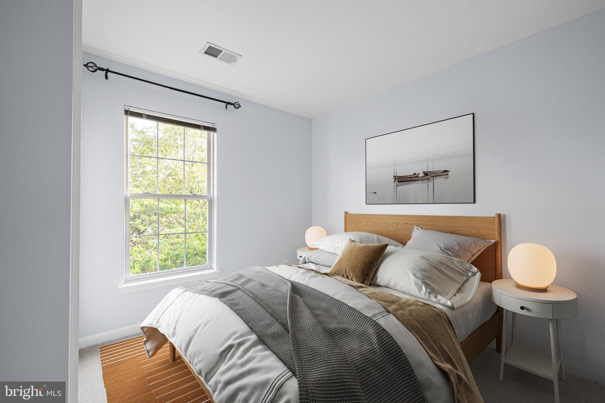 43002 Center Street Chantilly, VA 20152 - Photo 17 of 35 a bedroom with a bed and a window