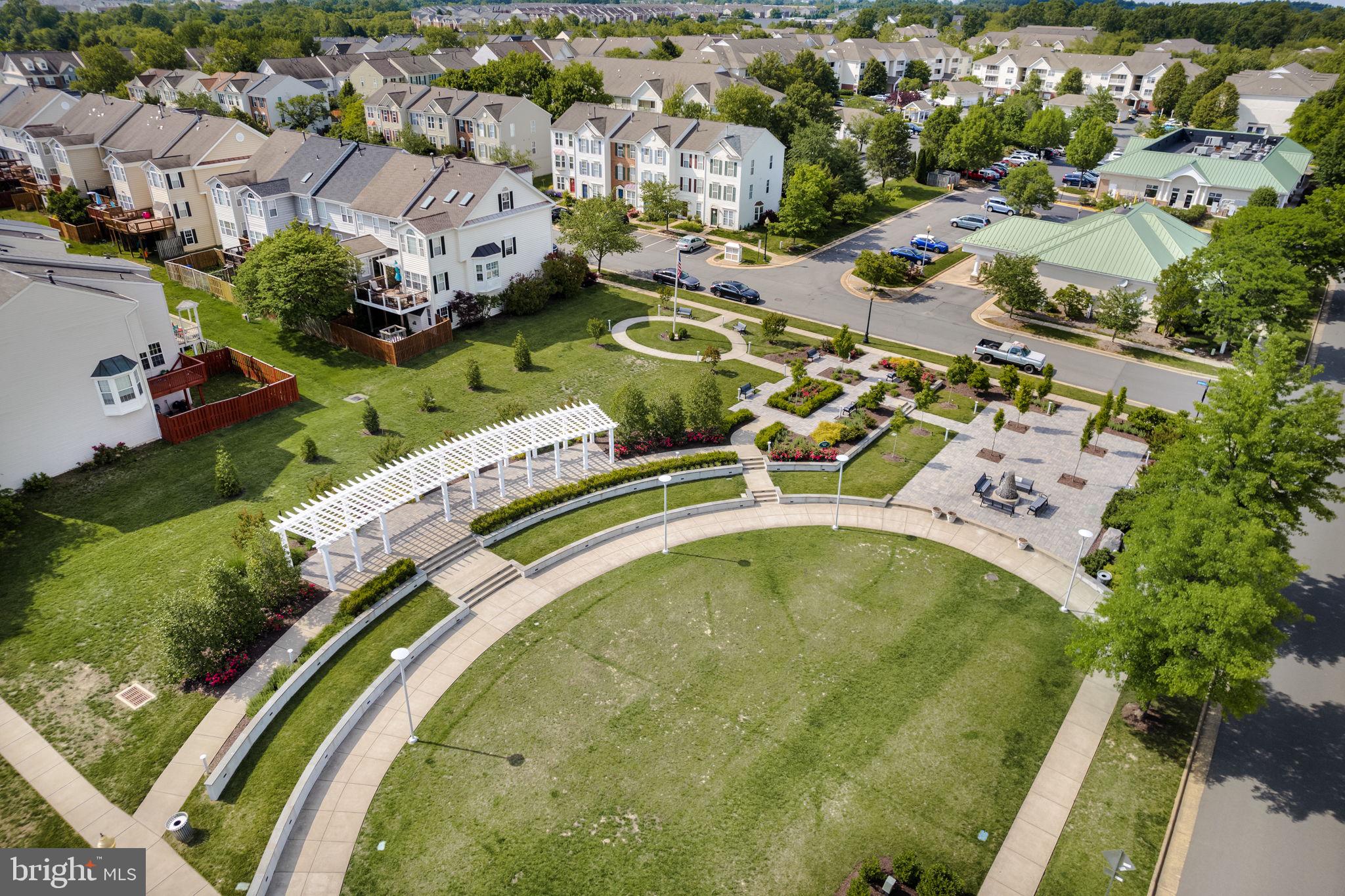 43002 Center Street Chantilly, VA 20152 - Photo 23 of 35 an aerial view of a house with a swimming pool yard and mountain view