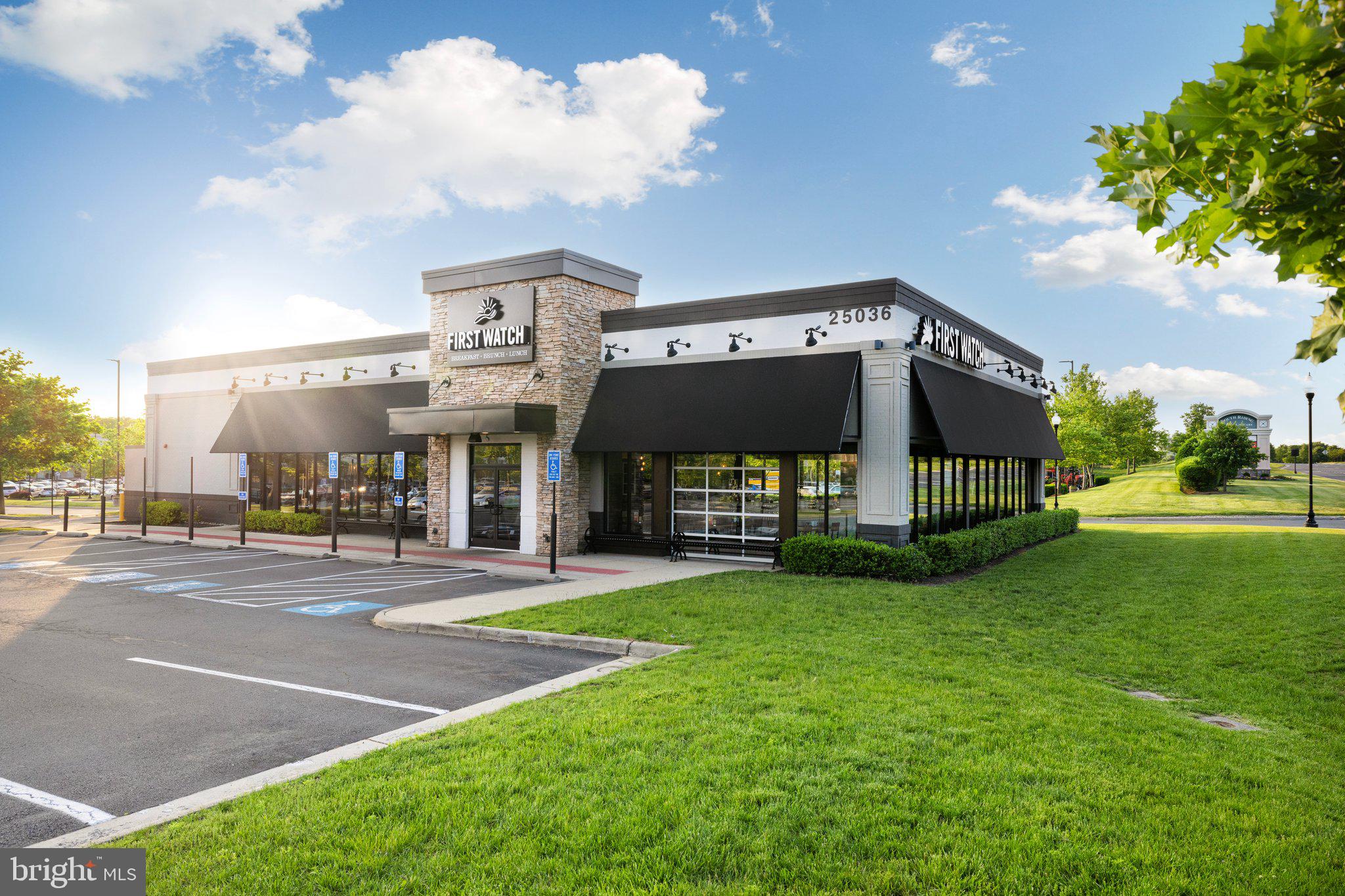 43002 Center Street Chantilly, VA 20152 - Photo 32 of 35 a view of a building with a yard