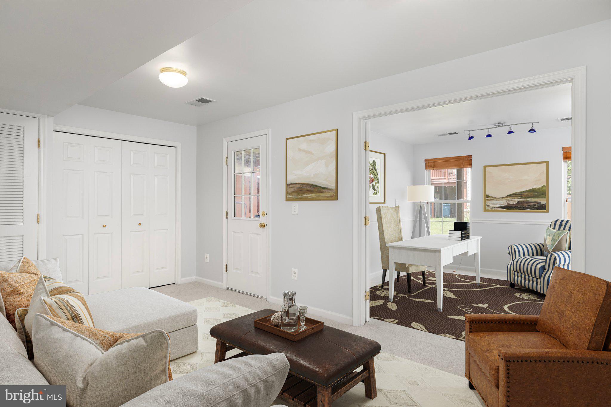 43002 Center Street Chantilly, VA 20152 - Photo 4 of 35 a living room with furniture and a table
