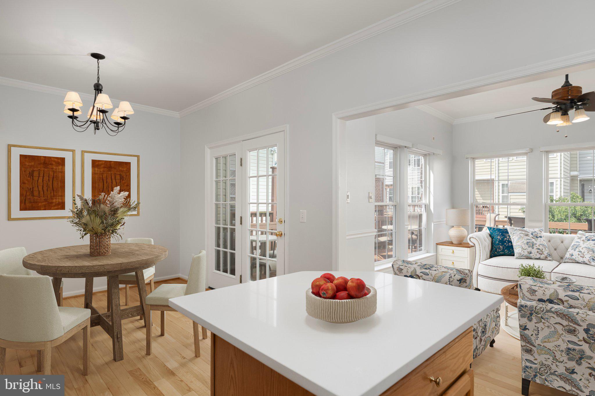 43002 Center Street Chantilly, VA 20152 - Photo 6 of 35 a view of a dining room with furniture and wooden floor