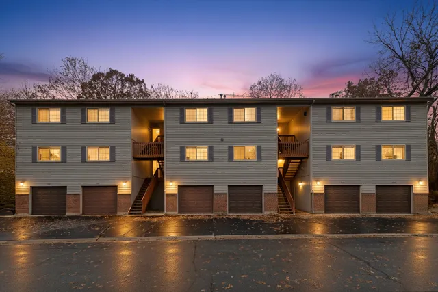 a front view of a house with yard