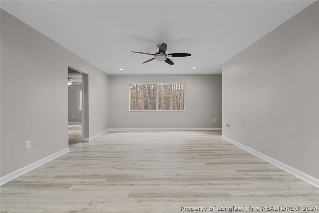 7039 Pine Road Sanford, NC 27332 - Photo 19 of 35 a view of an empty room with a window