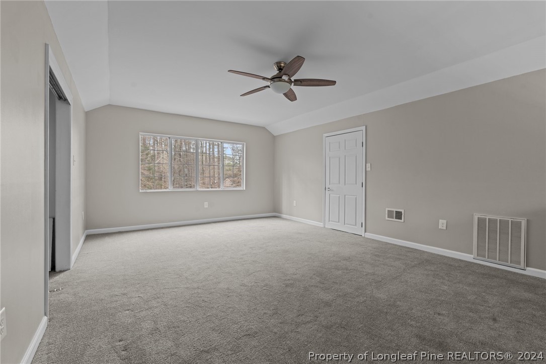 7039 Pine Road Sanford, NC 27332 - Photo 26 of 35 a view of an empty room with a window
