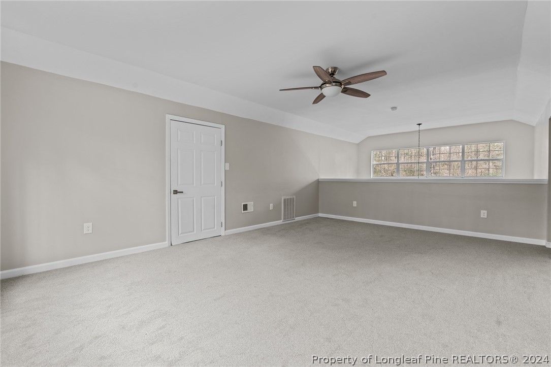 7039 Pine Road Sanford, NC 27332 - Photo 27 of 35 a view of an empty room with a window