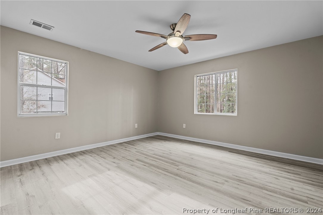 7039 Pine Road Sanford, NC 27332 - Photo 28 of 35 a view of an empty room with a window