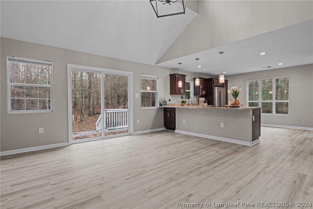 7039 Pine Road Sanford, NC 27332 - Photo 8 of 35 a view of a kitchen with a sink and microwave