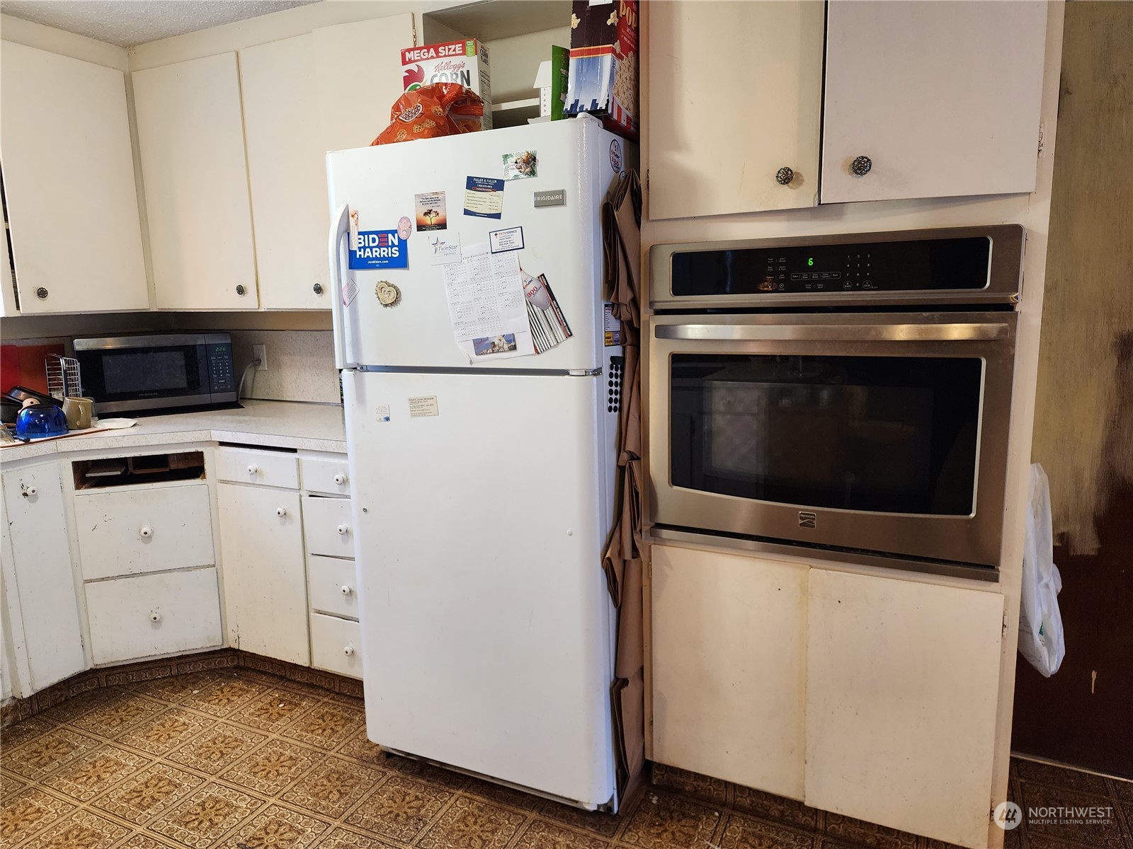 447 Independence Road Rochester, WA 98579 - Photo 7 of 35 a white refrigerator freezer and a stove sitting inside of a kitchen