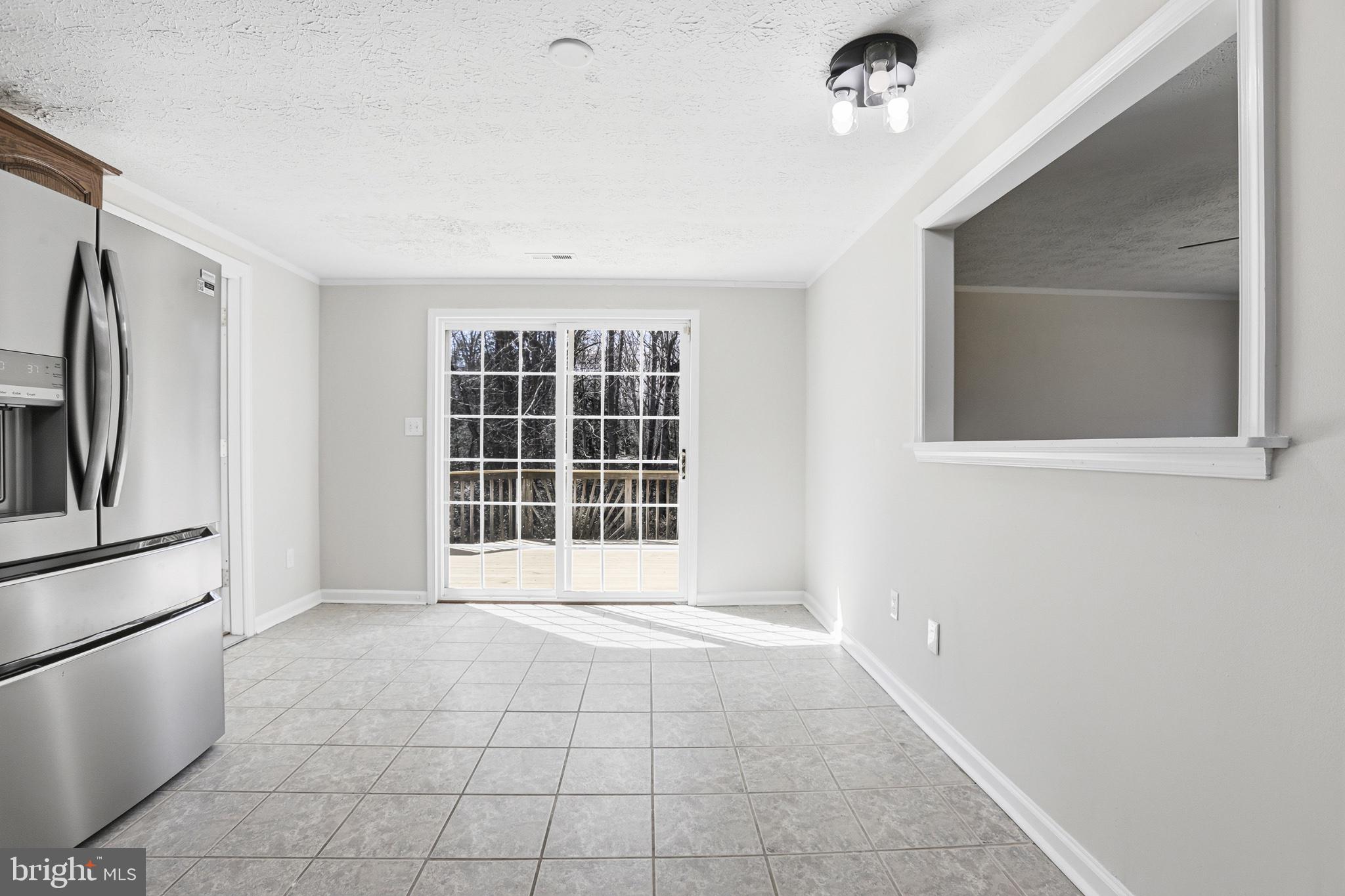 7012 Stanley Road King George, VA 22485 - Photo 12 of 37 Bright and airy kitchen space.