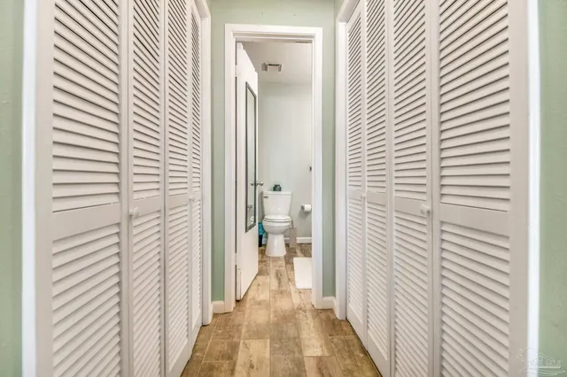 a view of a bathroom from the hallway