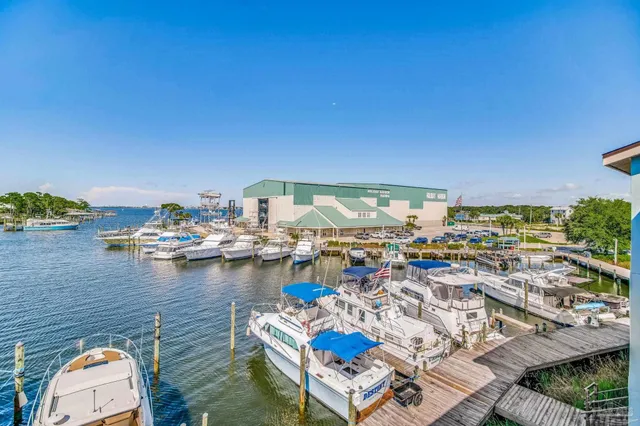 a view of swimming pool with outdoor seating
