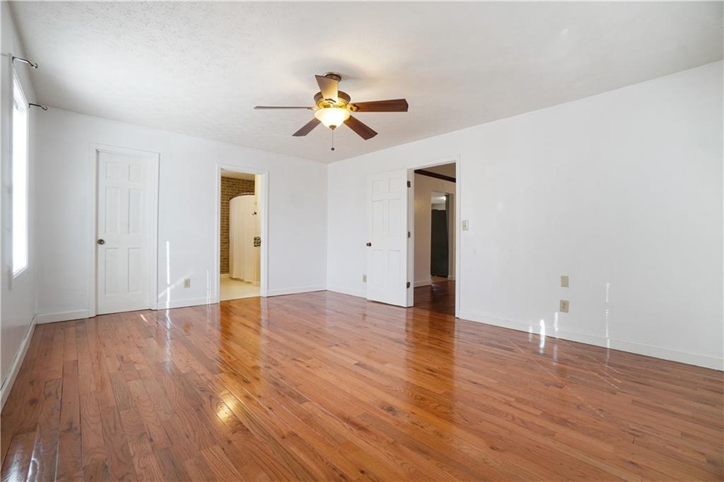 5295 Ridge Road Douglasville, GA 30134 - Photo 18 of 35 a view of an empty room with wooden floor