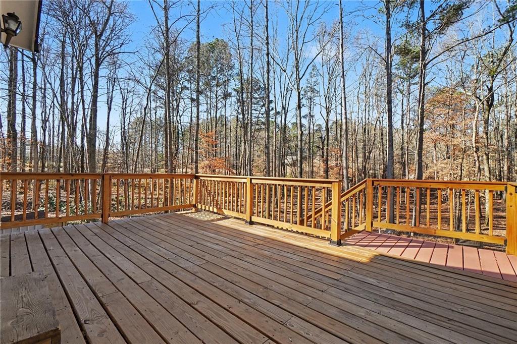 5295 Ridge Road Douglasville, GA 30134 - Photo 25 of 35 a view of wooden balcony with wooden floor and fence