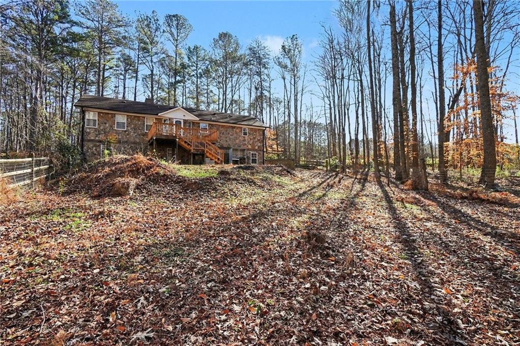 5295 Ridge Road Douglasville, GA 30134 - Photo 27 of 35 a view of a backyard with large trees