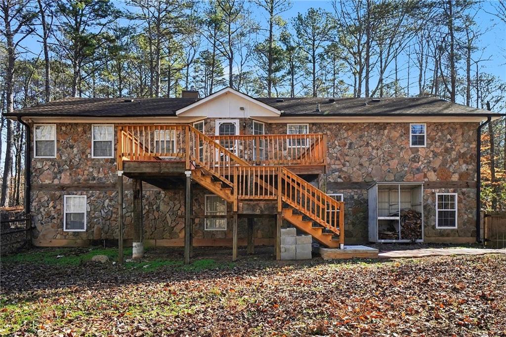5295 Ridge Road Douglasville, GA 30134 - Photo 30 of 35 a front view of a house with a yard