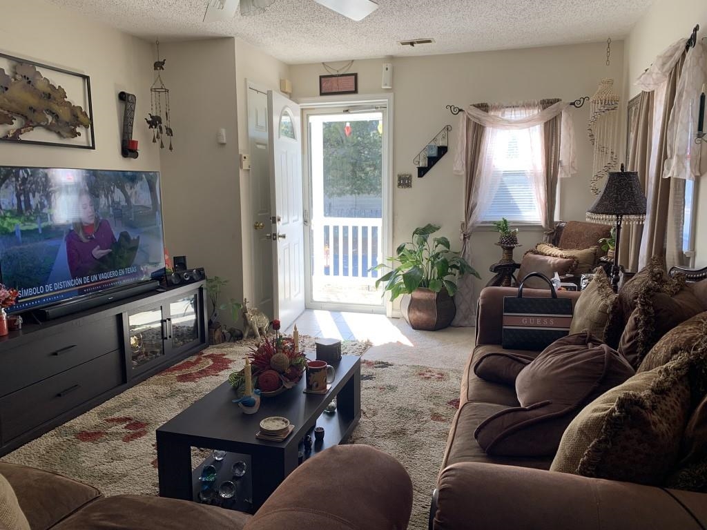 600 Delaware Avenue Rio Grande, NJ 08242 - Photo 4 of 15 a living room with furniture a flat screen tv and a window