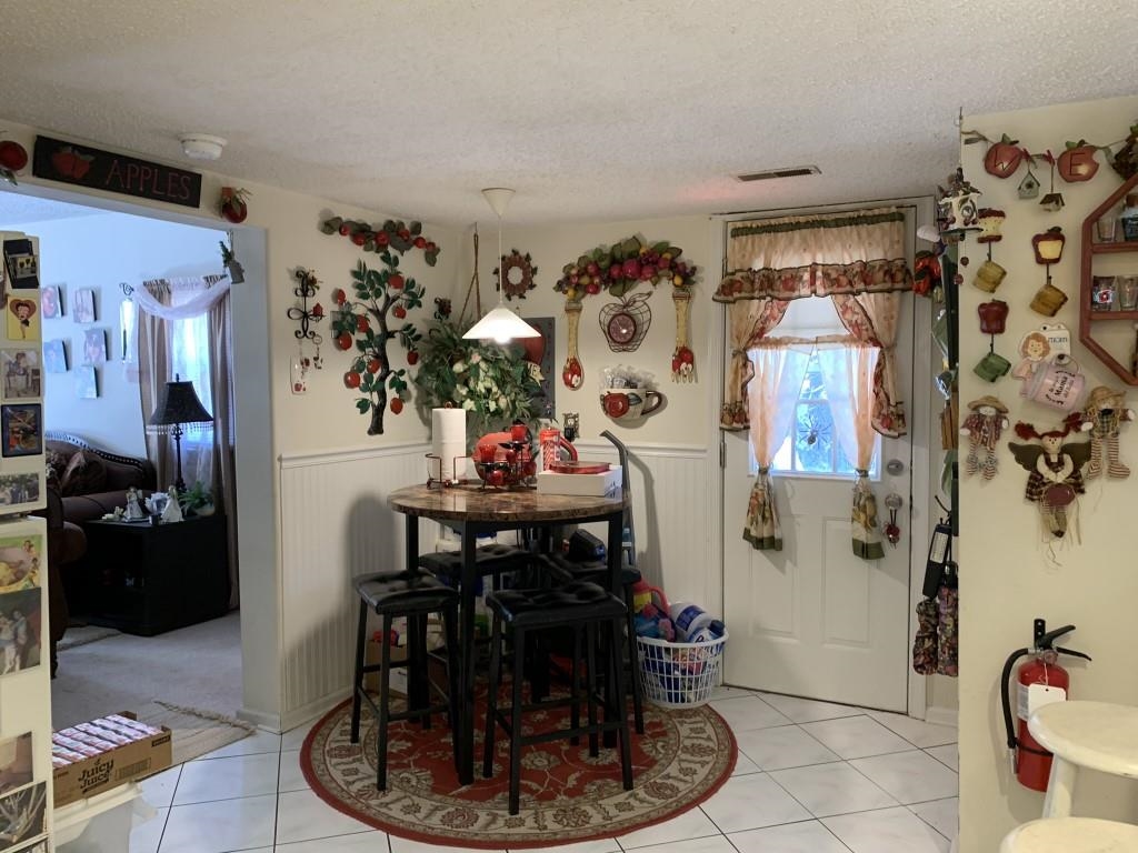 600 Delaware Avenue Rio Grande, NJ 08242 - Photo 5 of 15 a view of a dining room with shelves and furniture
