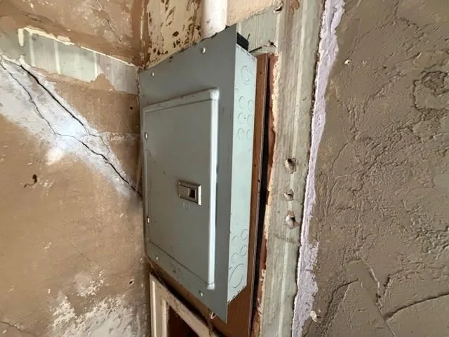a bathroom with a shower and a mirror