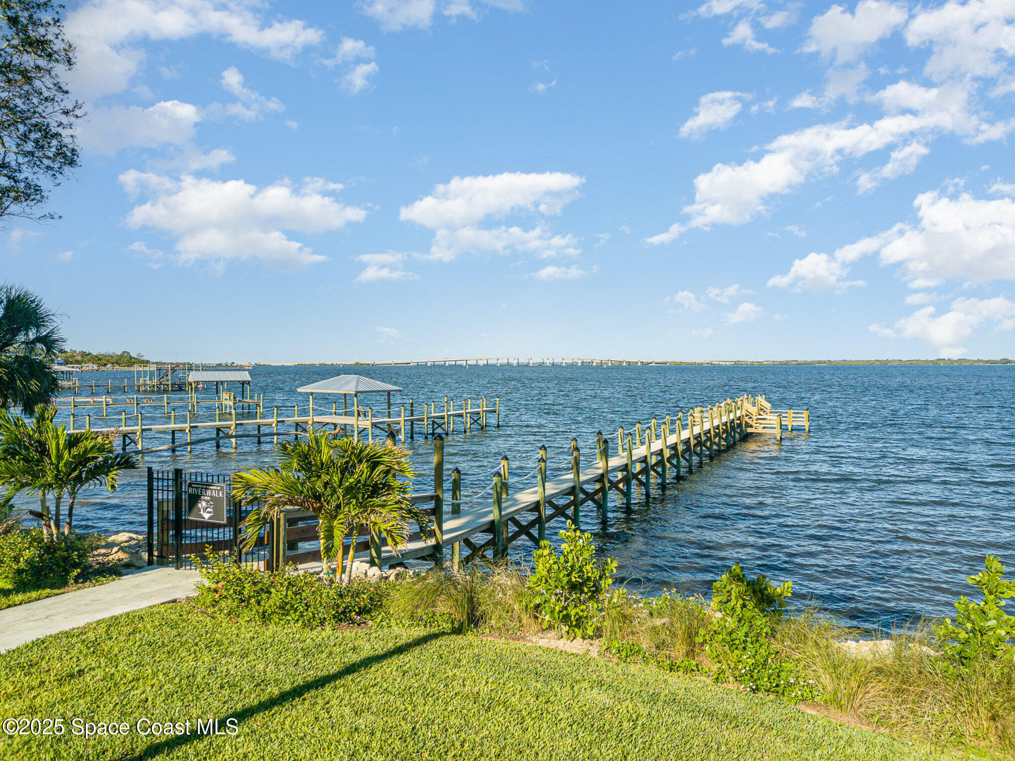 245 1st Street Cocoa, FL 32922 - Photo 21 of 34 a view of a lake with a yard