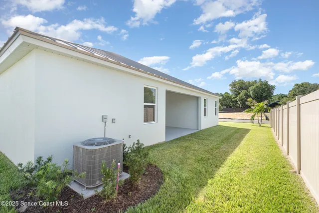 a view of backyard of house
