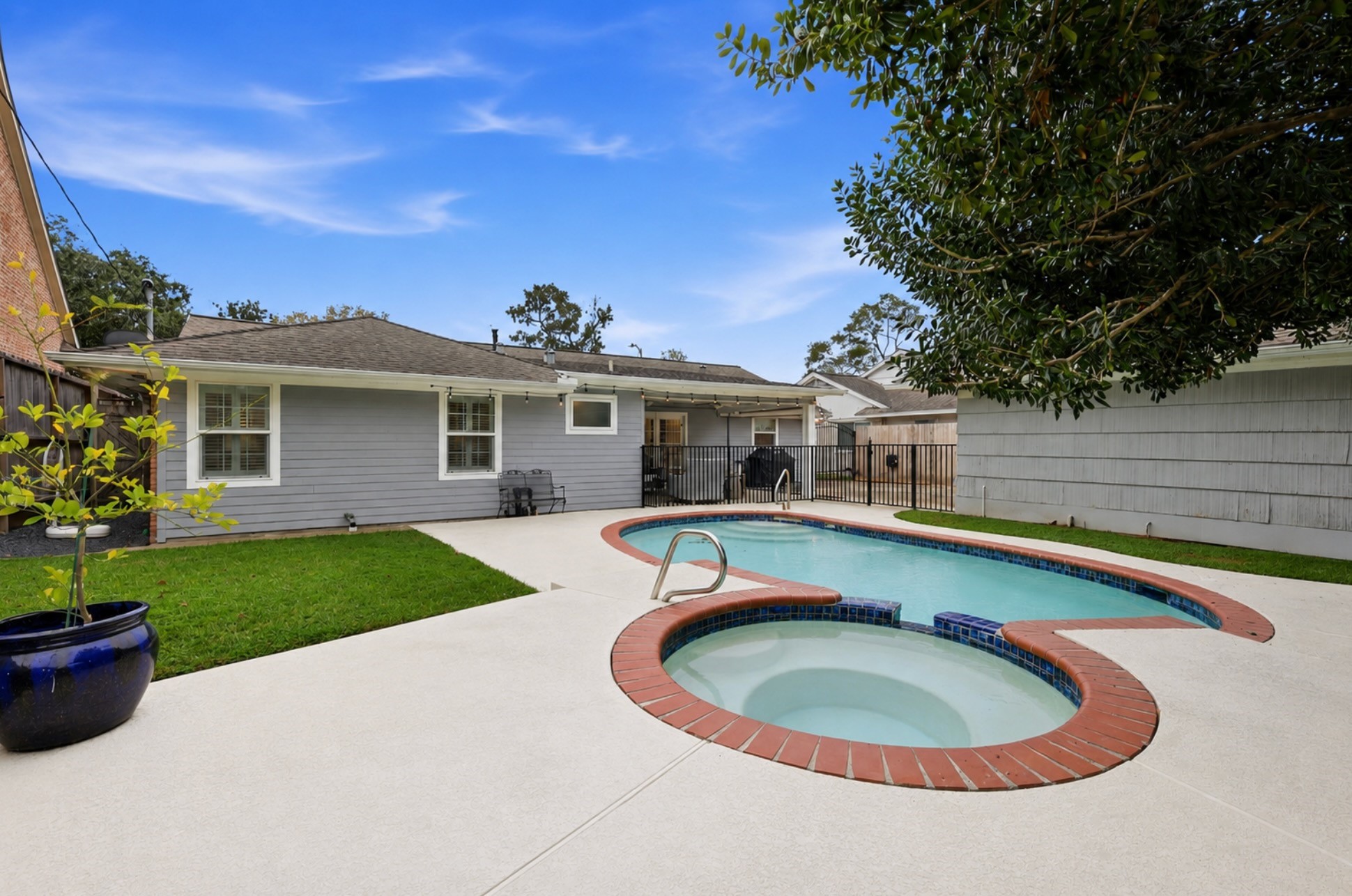 6236 Locke Lane Houston, TX 77057 - Photo 27 of 35 Alternate view of the backyard looking toward the home.