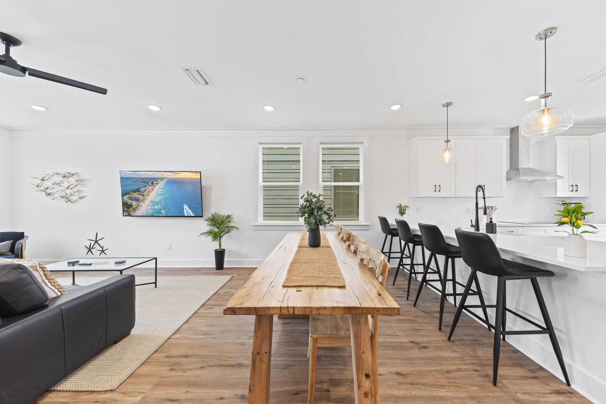 50 Blue Eden Loop, Unit LOT 39 Santa Rosa Beach, FL 32459 - Photo 12 of 46 a living room with furniture a wooden floor and kitchen view