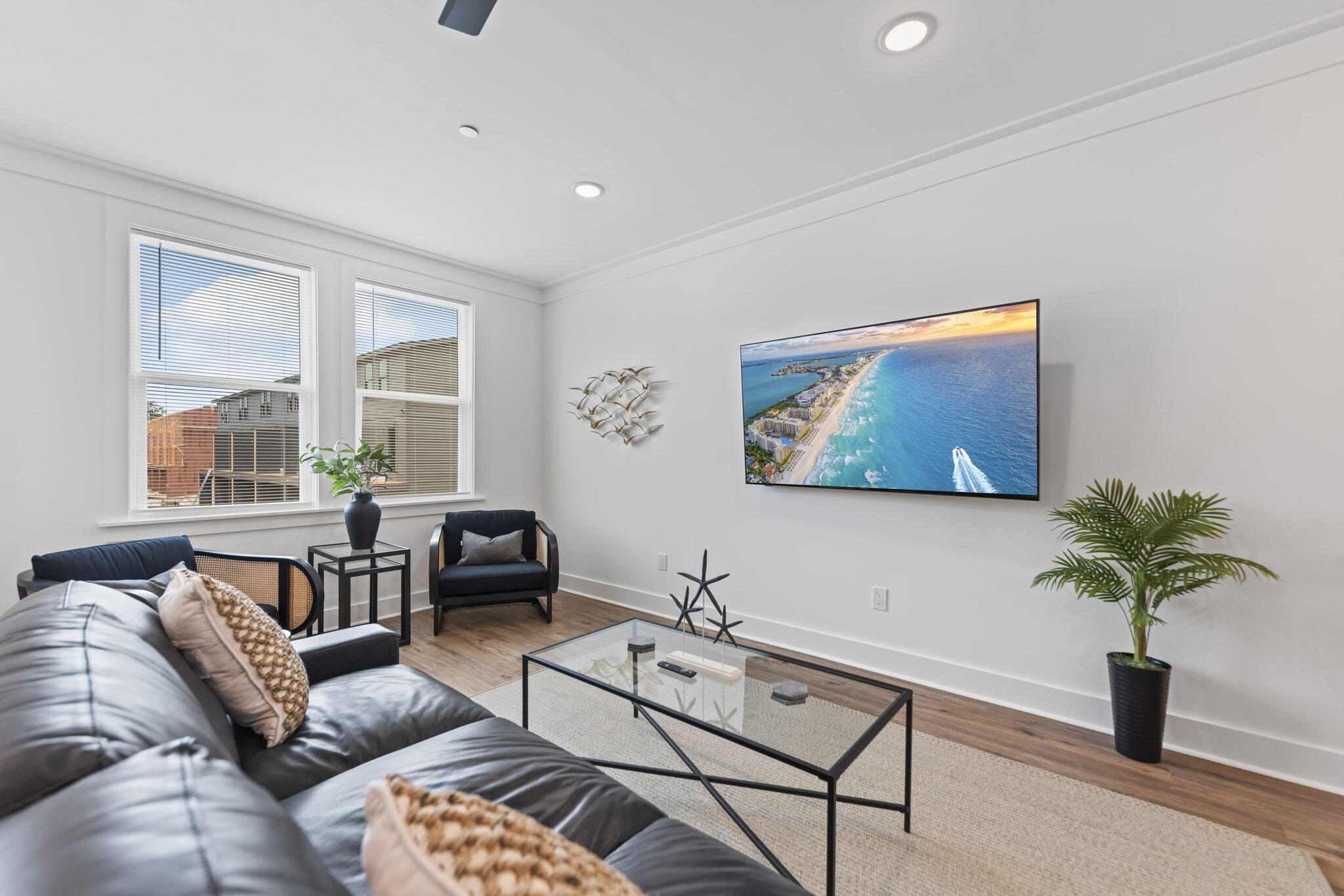 50 Blue Eden Loop, Unit LOT 39 Santa Rosa Beach, FL 32459 - Photo 3 of 46 a living room with furniture and a large window