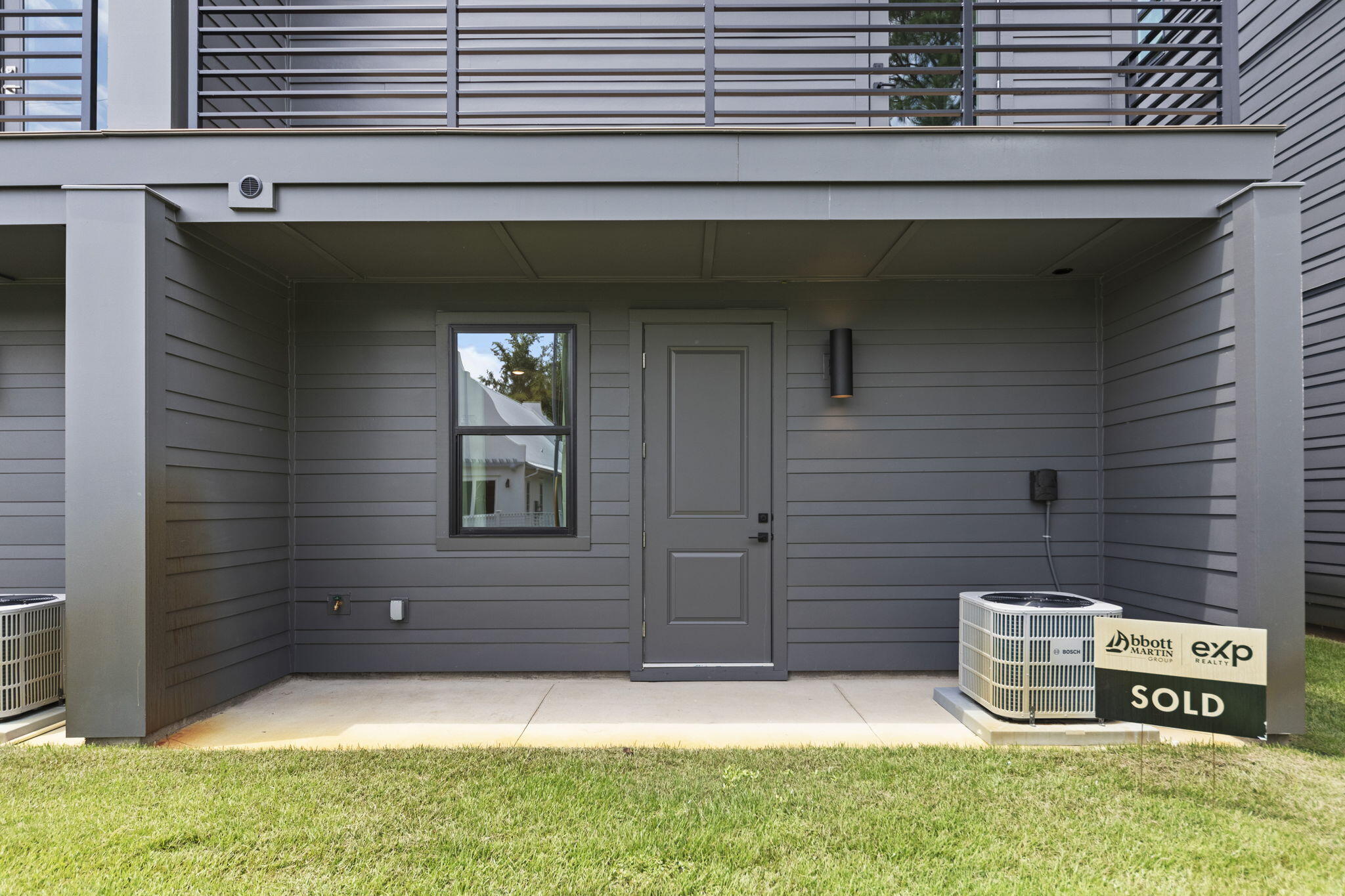50 Blue Eden Loop, Unit LOT 39 Santa Rosa Beach, FL 32459 - Photo 41 of 46 a front view of a house with garden