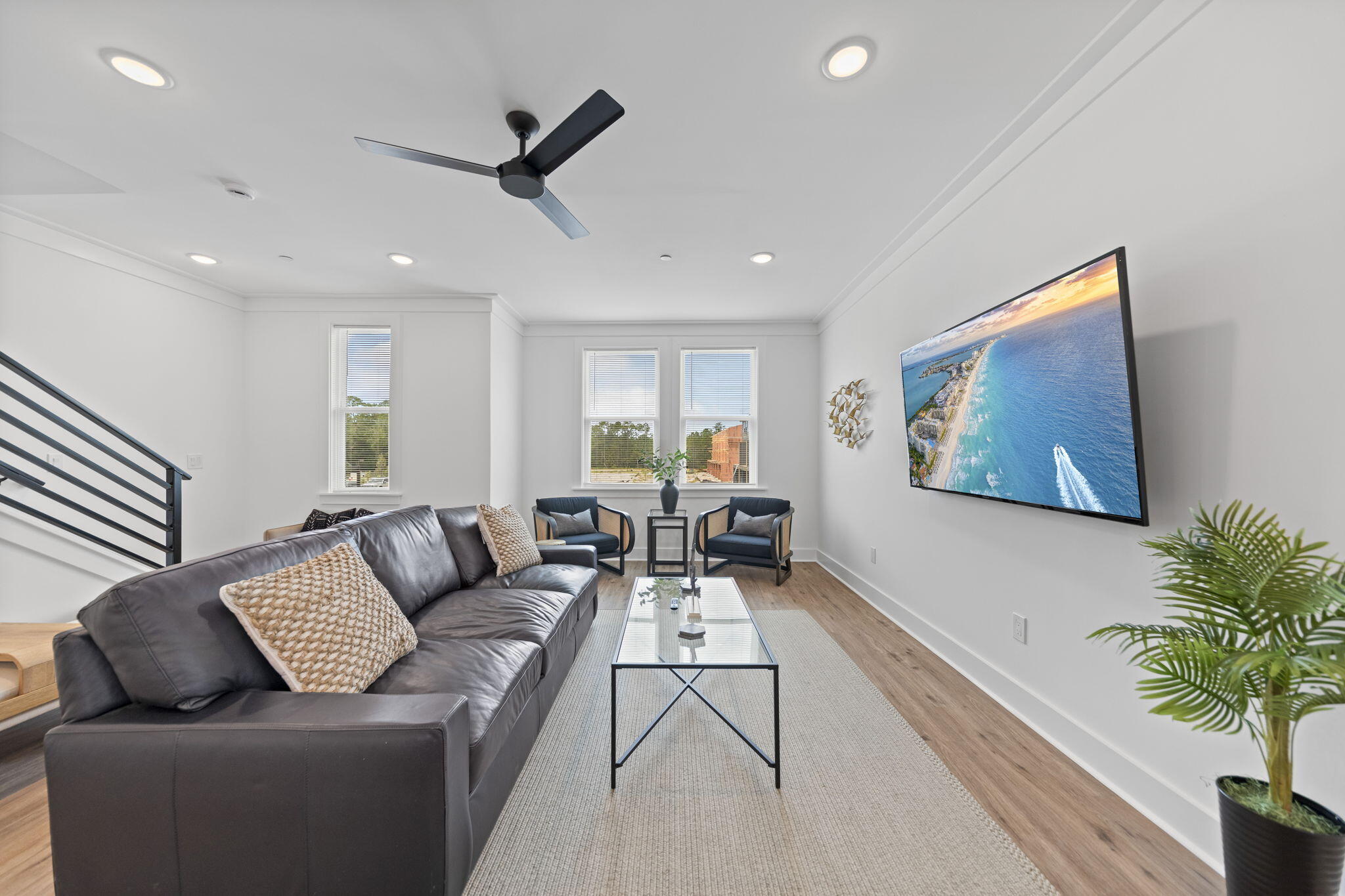 50 Blue Eden Loop, Unit LOT 39 Santa Rosa Beach, FL 32459 - Photo 5 of 46 a living room with furniture and a ceiling fan