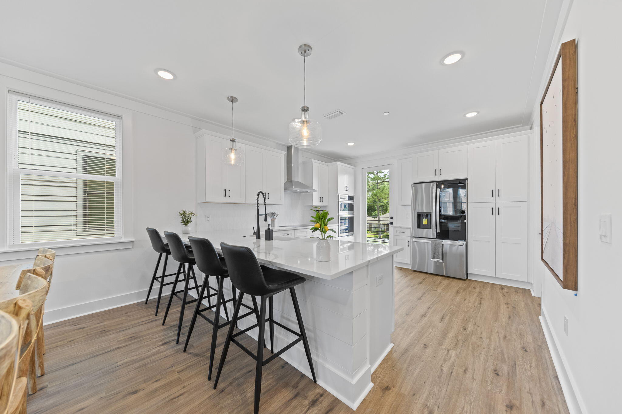 50 Blue Eden Loop, Unit LOT 39 Santa Rosa Beach, FL 32459 - Photo 10 of 46 a view of a dining room with furniture and wooden floor