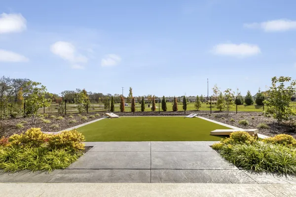 a view of a swimming pool and an outdoor space