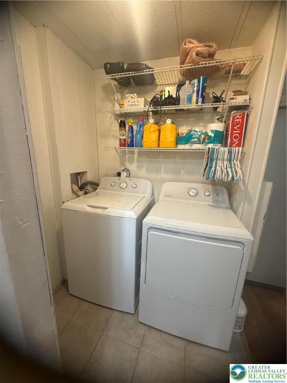 17 Bordic Road Reading, PA 19606 - Photo 11 of 19 a utility room with dryer and washer