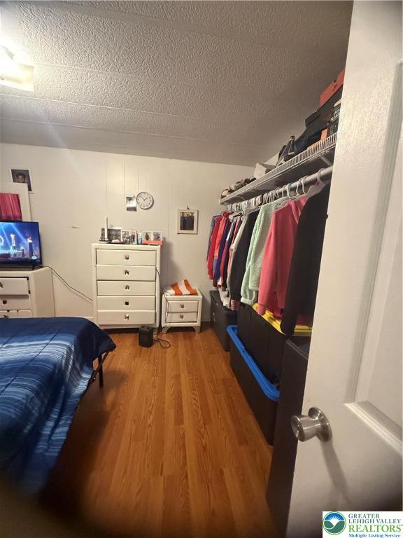 17 Bordic Road Reading, PA 19606 - Photo 15 of 19 a bedroom with a bed and a walk in closet