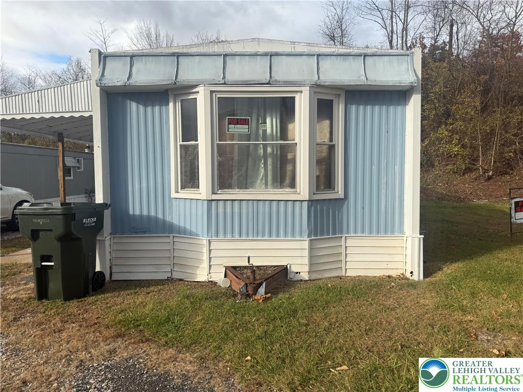 17 Bordic Road Reading, PA 19606 - Photo 2 of 19 a front view of a house with a porch