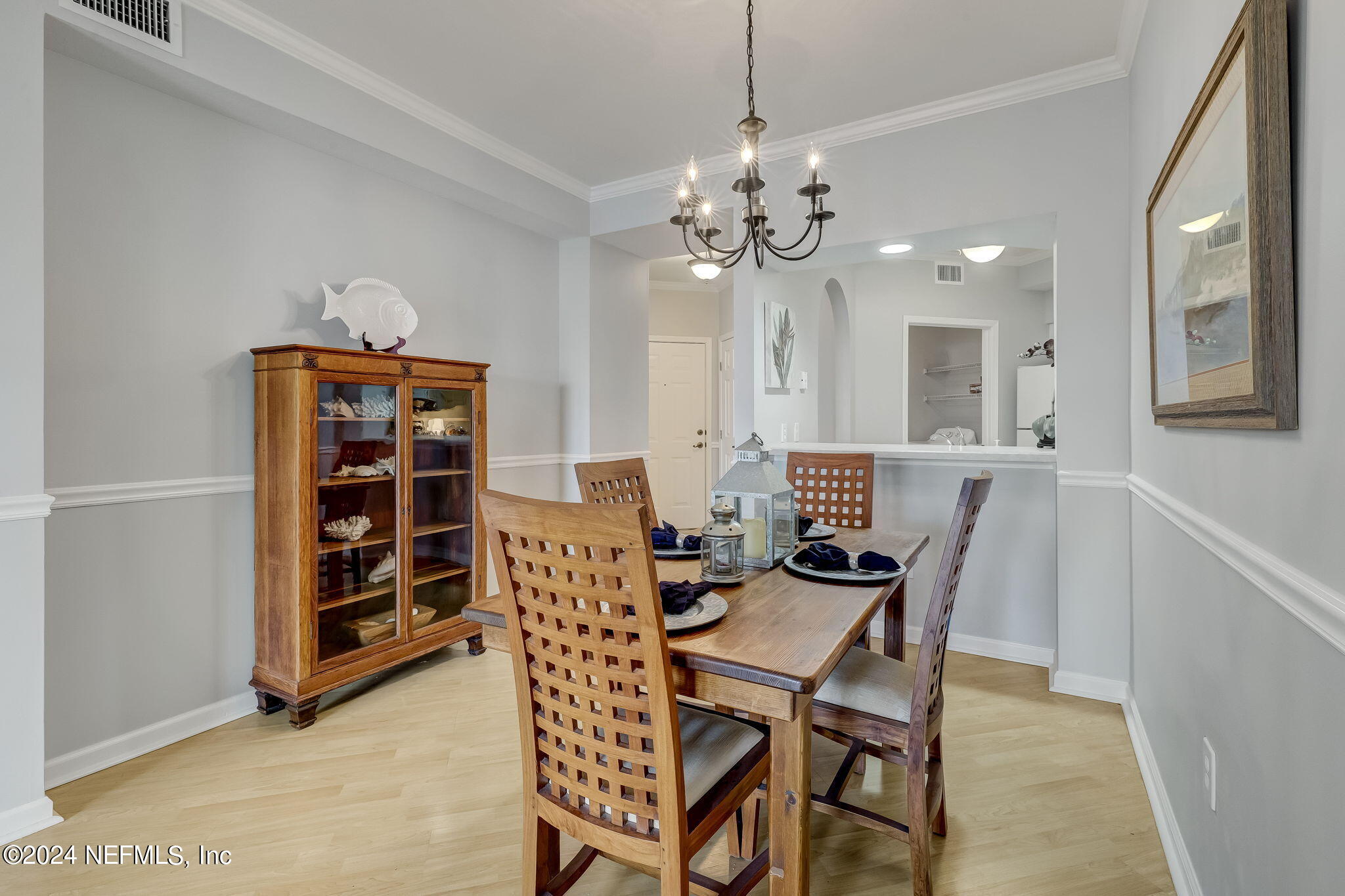 3302 Haley Pointe Road St. Augustine, FL 32084 - Photo 11 of 53 a view of a dining room with furniture and chandelier