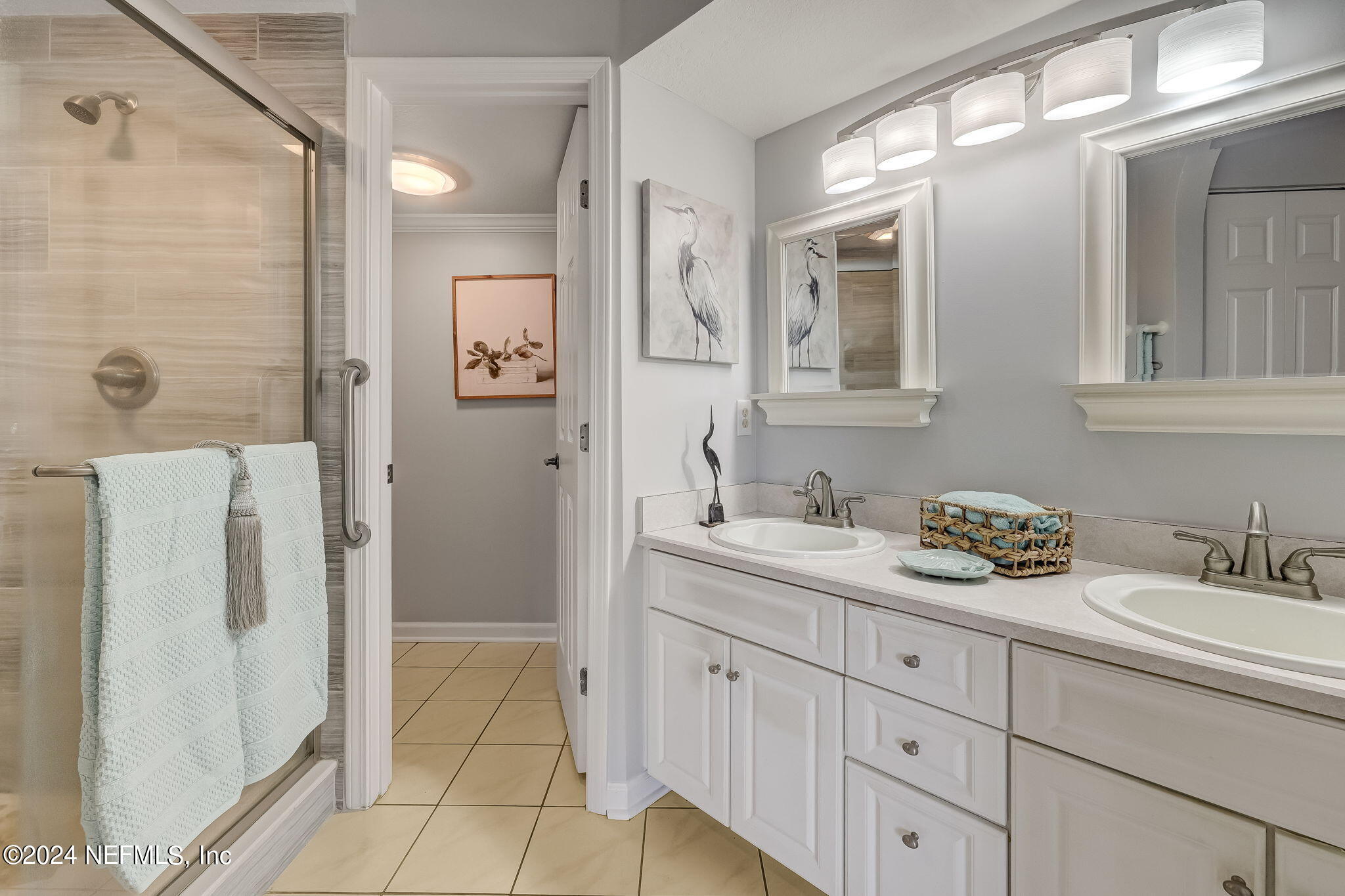 3302 Haley Pointe Road St. Augustine, FL 32084 - Photo 15 of 53 a spacious bathroom with double vanity a mirror a shower and vanity