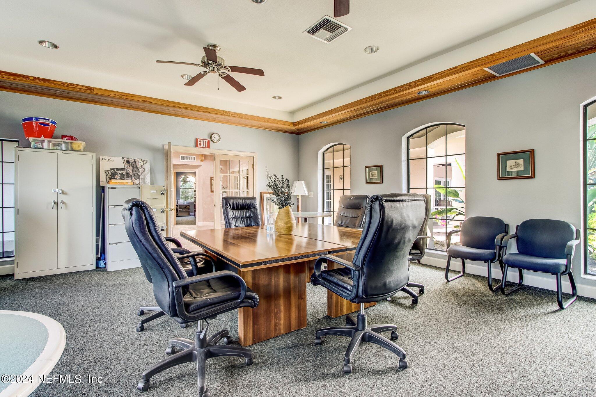 3302 Haley Pointe Road St. Augustine, FL 32084 - Photo 51 of 53 a workspace with chandelier