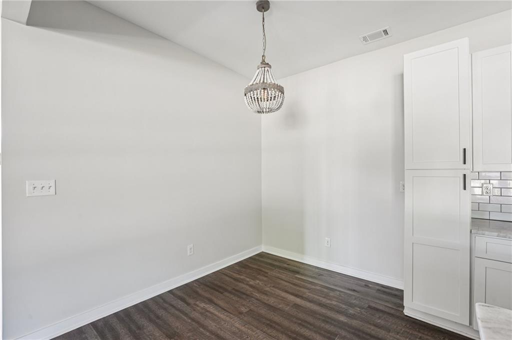 212 Hamilton Avenue Bremen, GA 30110 - Photo 23 of 65 a view of a room with wooden floor