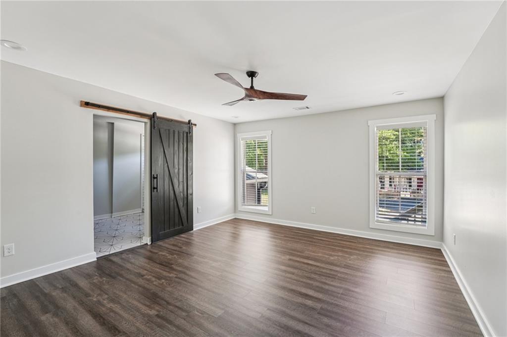 212 Hamilton Avenue Bremen, GA 30110 - Photo 28 of 65 wooden floor in an empty room with a window
