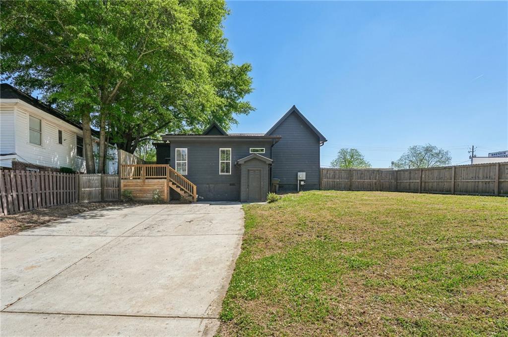 212 Hamilton Avenue Bremen, GA 30110 - Photo 50 of 65 a house view with a garden space
