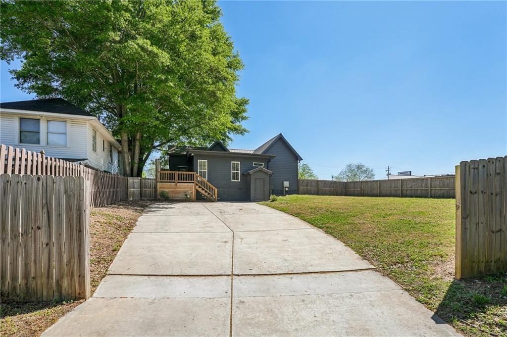 212 Hamilton Avenue Bremen, GA 30110 - Photo 51 of 65 a front view of a house with a yard and lake view