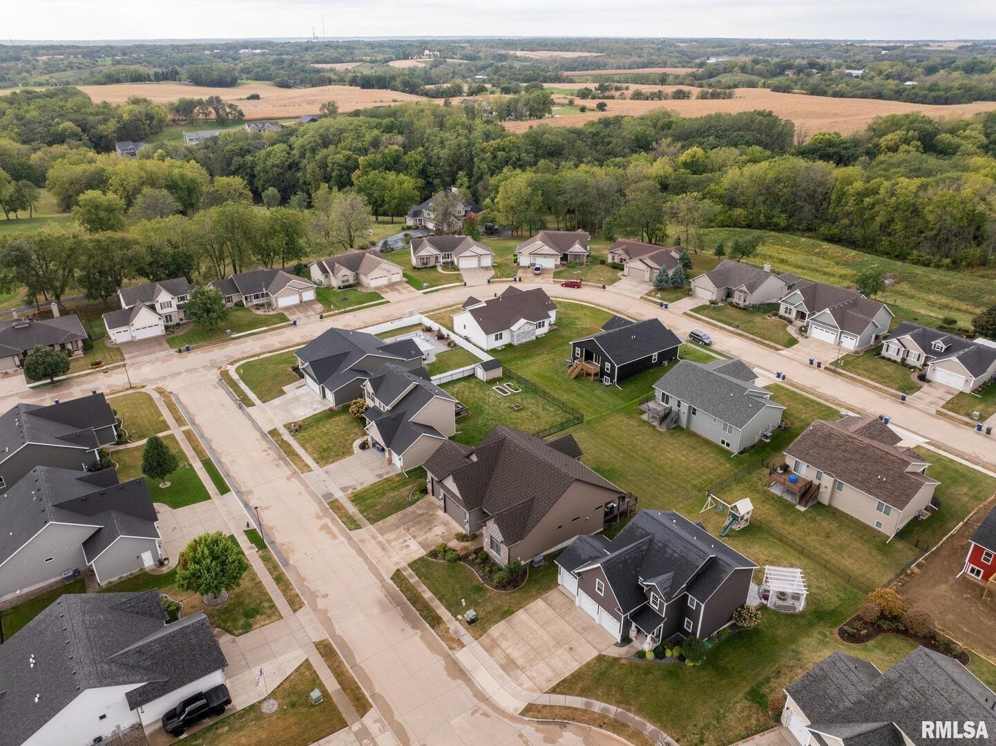 1422 Racine Court Davenport, IA 52804 - Photo 45 of 53 an aerial view of a city with lots of residential buildings