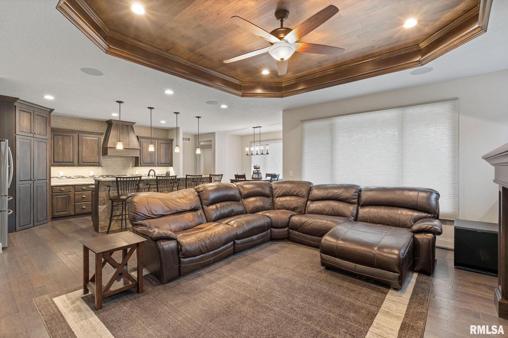 1422 Racine Court Davenport, IA 52804 - Photo 7 of 53 a living room with furniture and a view of kitchen