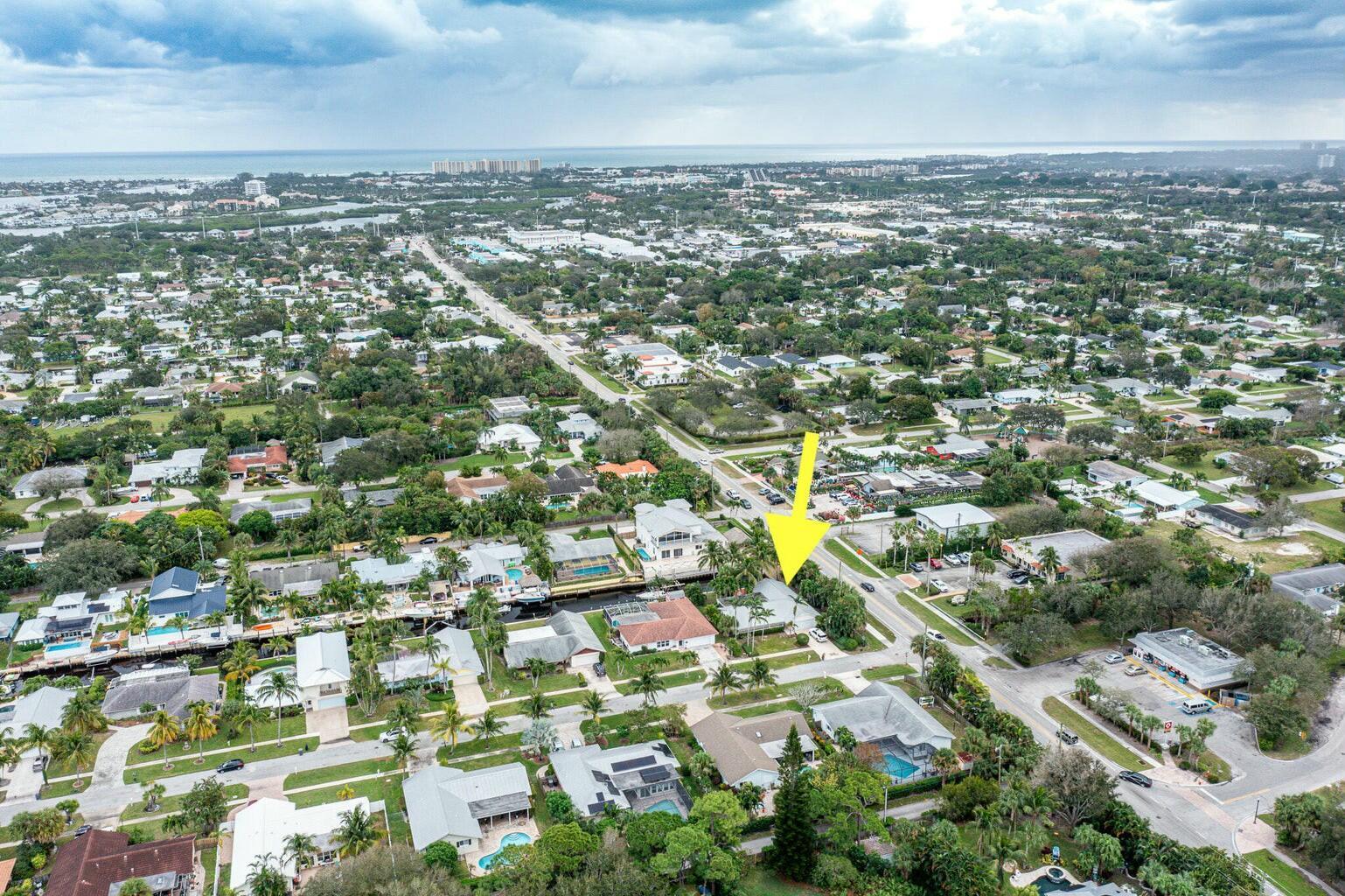 18014 Perigon Way Jupiter, FL 33458 - Photo 33 of 35 an aerial view of residential houses with outdoor space and trees