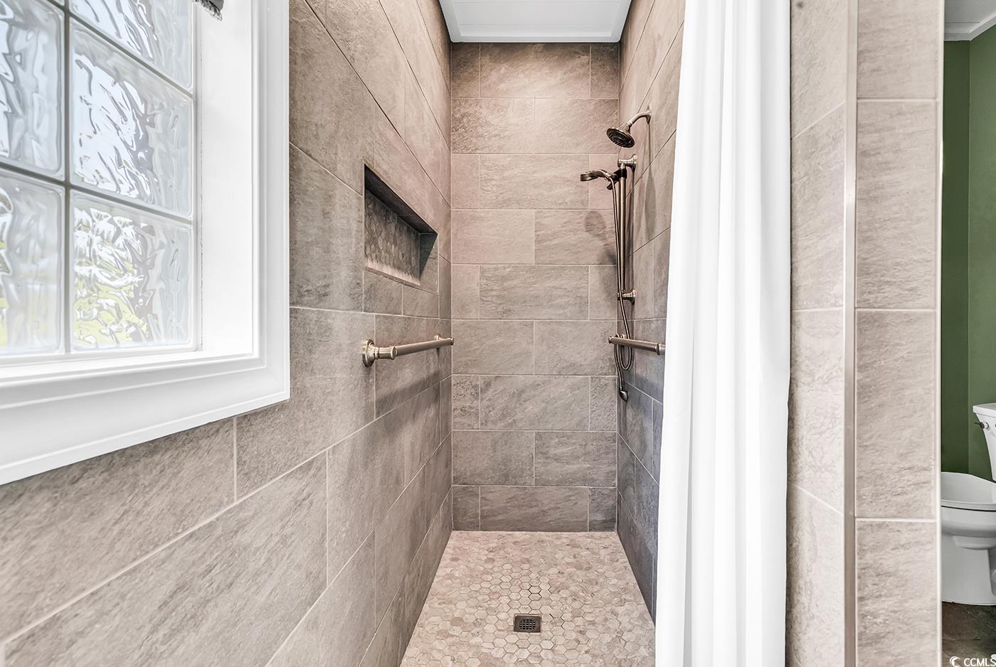 6161 Inman Circle Conway, SC 29526 - Photo 16 of 40 Full bathroom featuring toilet and tiled shower