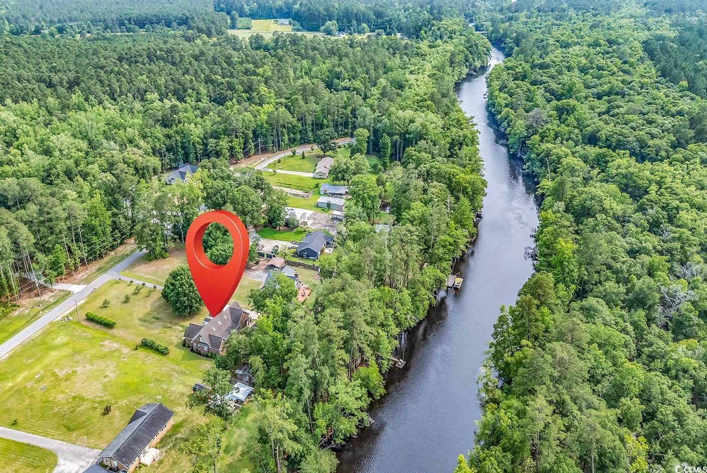 6161 Inman Circle Conway, SC 29526 - Photo 2 of 40 Aerial view of a large body of water and a heavily