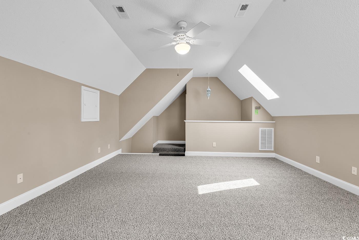 6161 Inman Circle Conway, SC 29526 - Photo 24 of 40 Bonus room with ceiling fan, a skylight, lofted ce