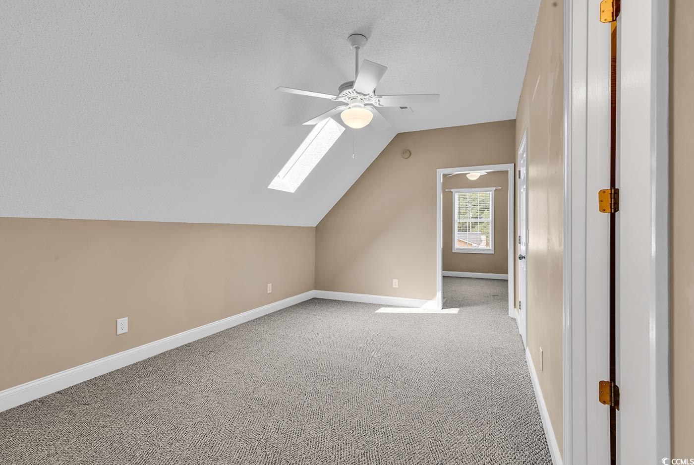 6161 Inman Circle Conway, SC 29526 - Photo 25 of 40 Bonus room featuring a ceiling fan, vaulted ceilin