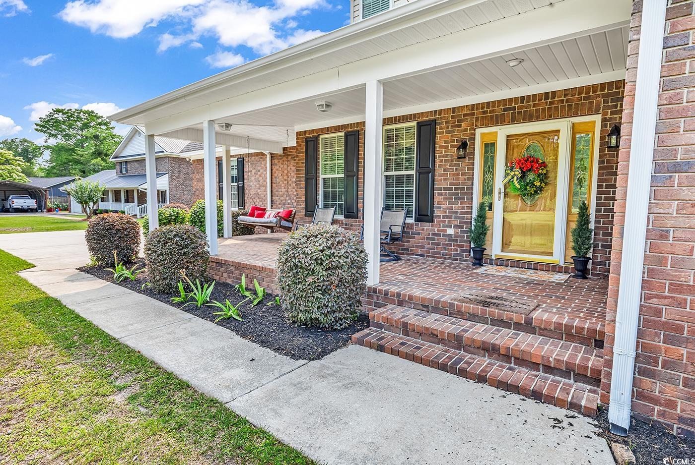 6161 Inman Circle Conway, SC 29526 - Photo 39 of 40 Entrance to property featuring a porch and brick s