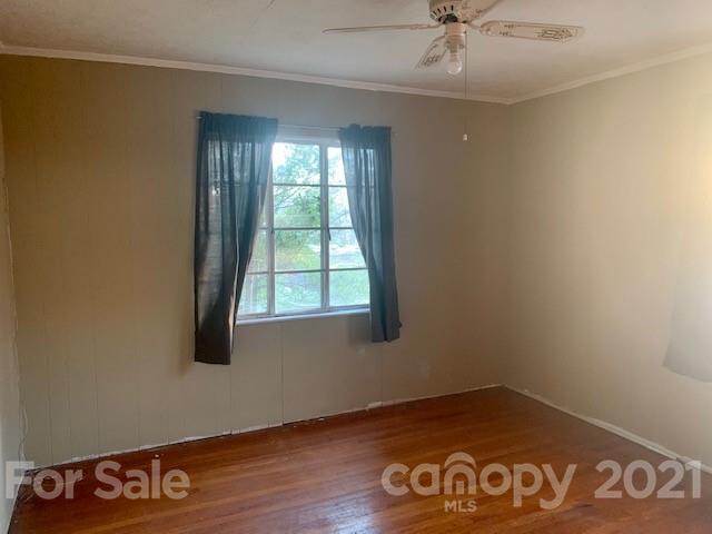 645 Thompson Cove Road Clyde, NC 28721 - Photo 9 of 12 an empty room with a window